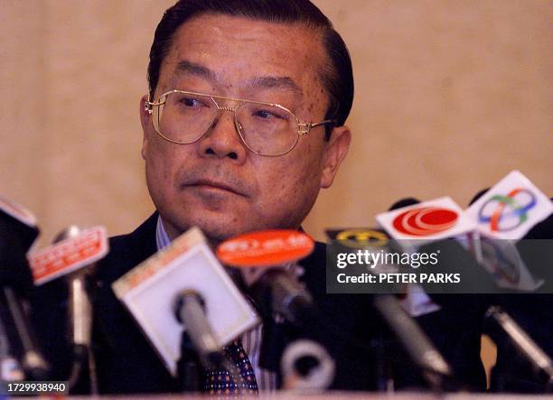 Vice president of the International Basketball Federation and Hong Kong businessman Carl Ching looks dejected during a press conference at a Kowloon...