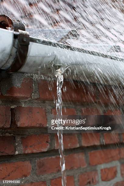 leaking gutter - damaged roof stock pictures, royalty-free photos & images