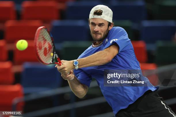 Tommy Paul of the United States returns a shot in the Men's Singles Round of 16 match against Andrey Rublev during on Day 10 of the 2023 Shanghai...