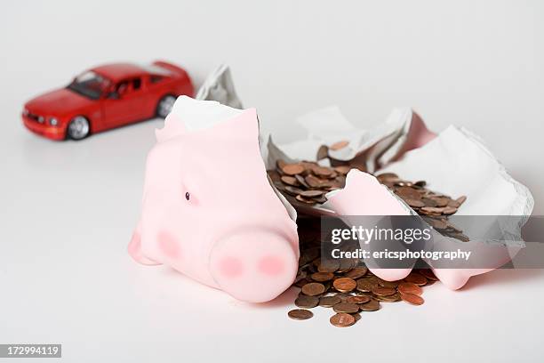 broken piggy bank and car model - auto loan stock pictures, royalty-free photos & images