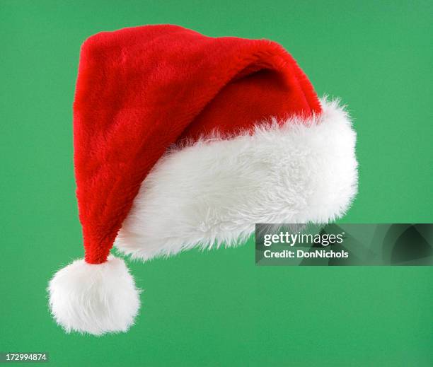 santa hat isolated - röd hatt bildbanksfoton och bilder