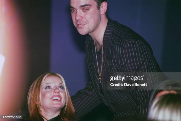 English singers Robbie Williams and Geri Halliwell attend the Capital Radio Awards ceremony, London, 26th March 1997.