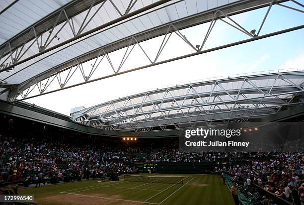 The roof closes over Centre Court during a break in the Gentlemen's Singles semi-final match between Andy Murray of Great Britain and Jerzy Janowicz...