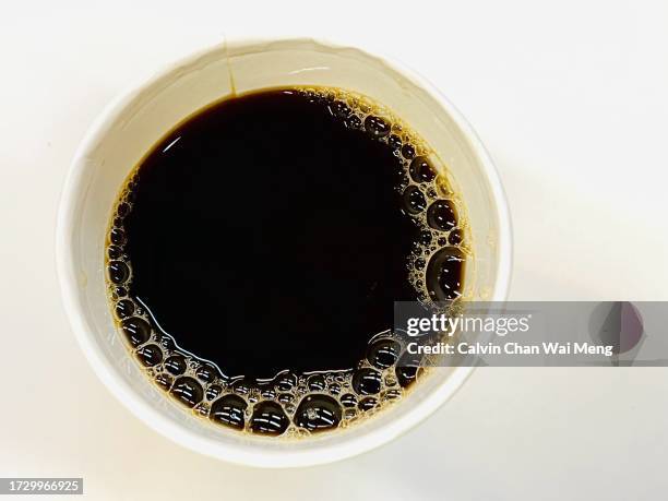 top down view of a cup of black coffee - disposable cup stock pictures, royalty-free photos & images