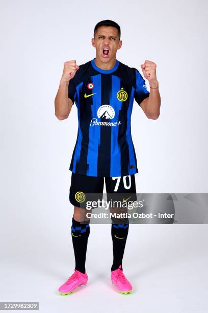 Alexis Sanchez of FC Internazionale pose for a photo during the official headshot media day at Appiano Gentile on August 12, 2023 in Como, Italy.