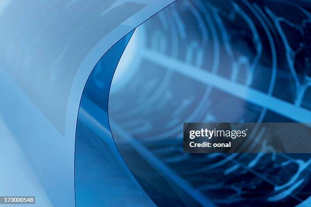 close-up of a rolled-up cat scan - cancer center stock pictures, royalty-free photos & images