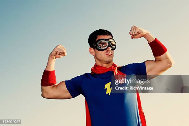 superhero - flexing muscles stock pictures, royalty-free photos & images