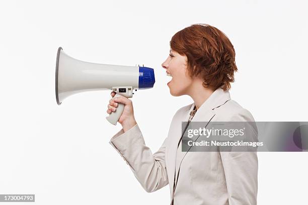 young woman shouting in megaphone - mouth open profile stock pictures, royalty-free photos & images