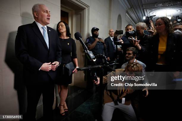 House Majority Leader Steve Scalise stands next to his wife Jennifer Scalise as he talks to reporters after the House Republican conference nominated...