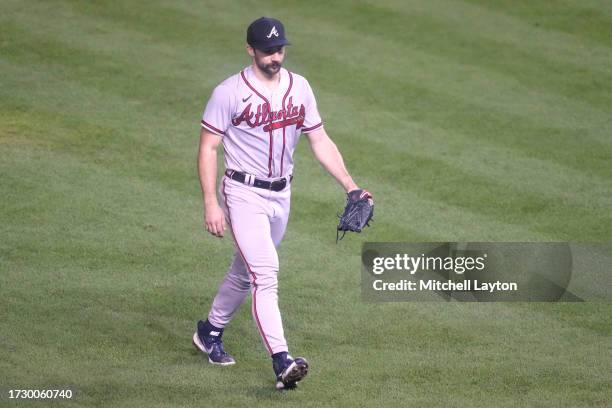 Spencer Strider of the Atlanta Braves walks back to the dug out between inning during game two of a doubleheader of a baseball game against the...