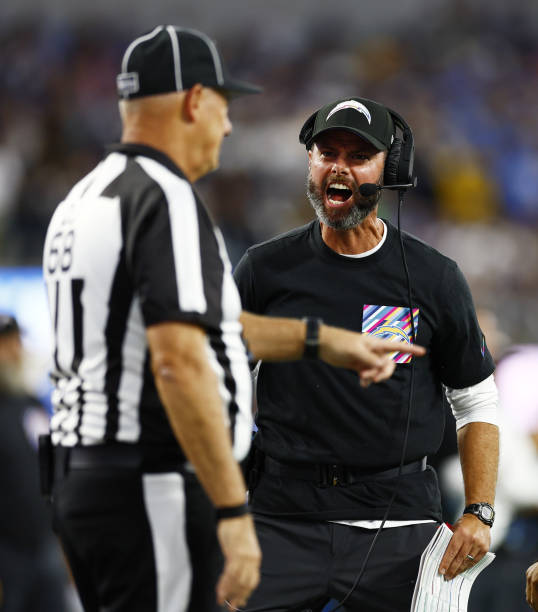 Los Angeles, CA Los Angeles Chargers head coach Brandon Staley speaks with the referee during there contest against the Dallas Cowboys at SoFi...