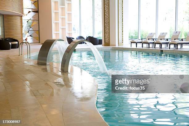 swimming pool - health farms stock pictures, royalty-free photos & images