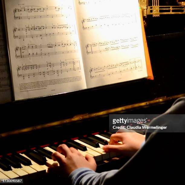 the young pianist - square interior stock pictures, royalty-free photos & images