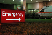Emergency room entrance sign with ambulance