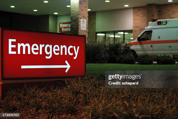 emergency room entrance sign with ambulance - catastrophe stock pictures, royalty-free photos & images