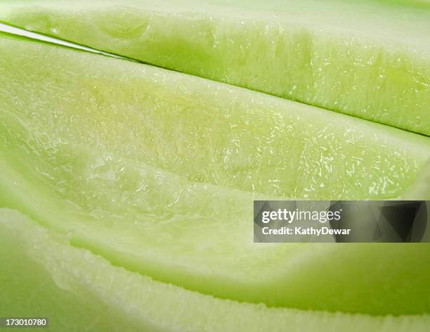 fresh ripe honeydew melon slices - honeydew melon stock pictures, royalty-free photos & images