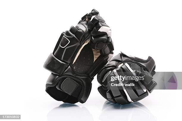 hockey gloves - hockey gear stock pictures, royalty-free photos & images