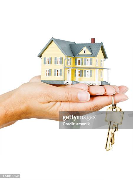 house and keys - house key hands stock pictures, royalty-free photos & images