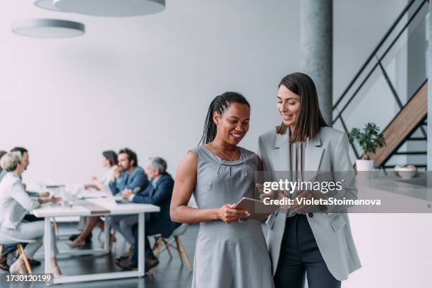 business people in the office. - business talk stock pictures, royalty-free photos & images