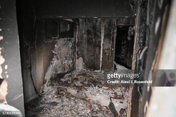 House is completely destroyed after being burned by Hamas militants during the attack at Kibbutz Be'eri, near the border with Gaza on October 11,...