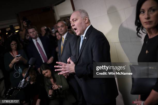 Speaker of the House nominee Rep. Steve Scalise , joined by his wife Jennifer , speaks to the media as he leaves a House Republican caucus meeting...