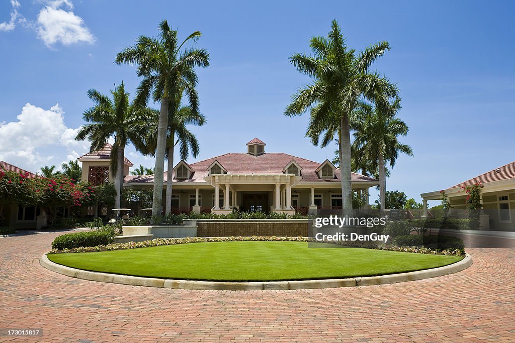 Impressive Clubhouse With Brick Driveway Florida Golf Community Wide Angle