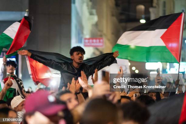 Demonstrators gather to show their solidarity with Palestine despite Austrian Police prohibiting the gathering on October 11, 2023 in Vienna,...