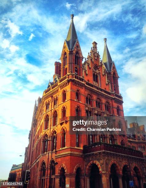 iconic gothic building designed by sir george gilbert scott in central london. st pancras in kings cross in june 2023 - sir stock pictures, royalty-free photos & images