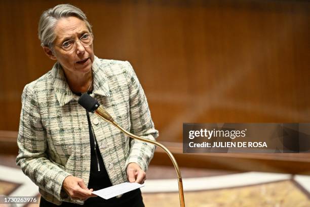 French Prime Minister Elisabeth Borne addresses a speech during a session of questions to the government at the French National Assembly on October...