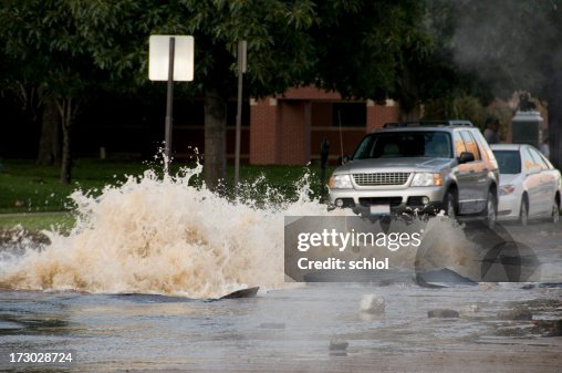 Water Main Exploding Exploding Water Main Causes Flooding High-Res Stock Photo - Getty Images