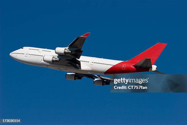 jet airliner - red plane stock pictures, royalty-free photos & images