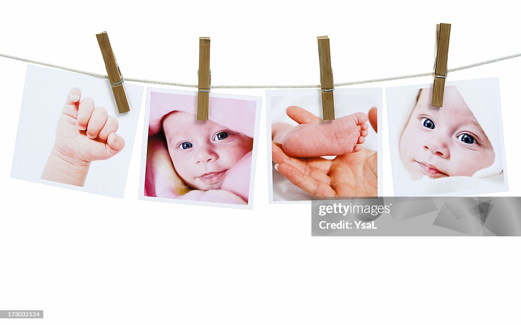 Four photographs hanging on the clothesline