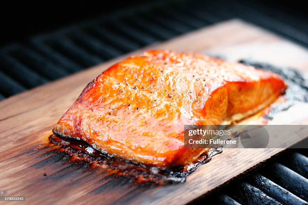 Cooked Cedar plank salmon on wood