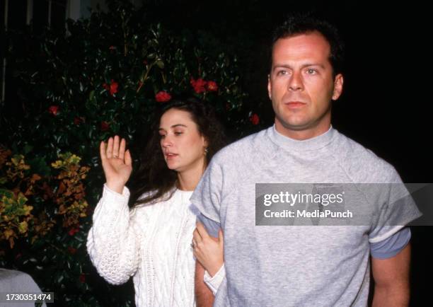 Bruce Willis and Demi Moore at the premiere of And God Created Woman at 20th Century Fox Studios in Los Angeles, California March 1988