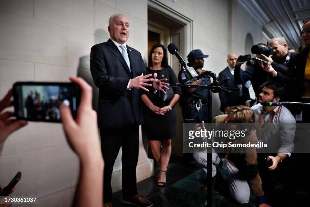 House Majority Leader Steve Scalise stands next to his wife Jennifer Scalise as he talks to reporters after the House Republican conference nominated...