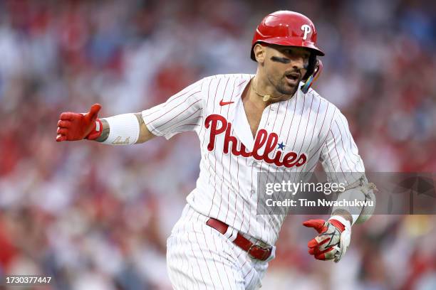 Nick Castellanos of the Philadelphia Phillies celebrates after hitting a solo home run against Bryce Elder of the Atlanta Braves during the third...