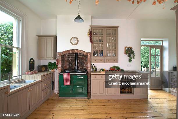 kitchen interior - aga cooker stock pictures, royalty-free photos & images