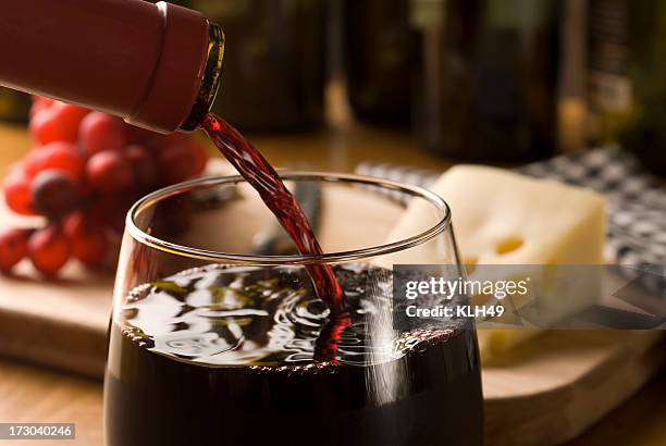 wine pour with cheese and grapes - cheese and wine bildbanksfoton och bilder