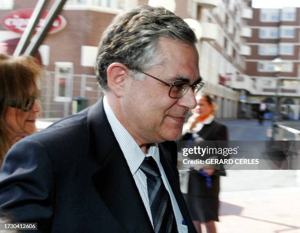Greek Lucas Papademos, vice chairman of the European Central Bank , arrives 09 September 2004 at the Kurhaus Hotel, near The Hague, before a working...