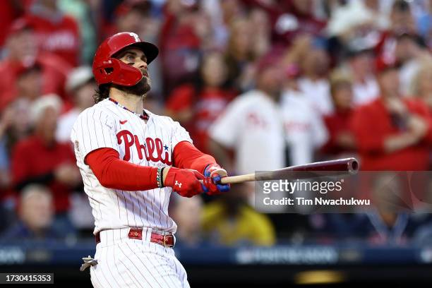 Bryce Harper of the Philadelphia Phillies hits a three run home run against Bryce Elder of the Atlanta Braves during the third inning in Game Three...