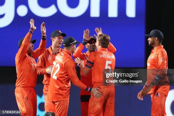Netherlands' Bas De Leede celebrates the wicket of Gerald Coetzee of South Africa during the game during the ICC Men's Cricket World Cup 2023 match...