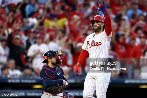 Bryce Harper of the Philadelphia Phillies celebrates after hitting a three run home run against Bryce Elder of the Atlanta Braves during the third...