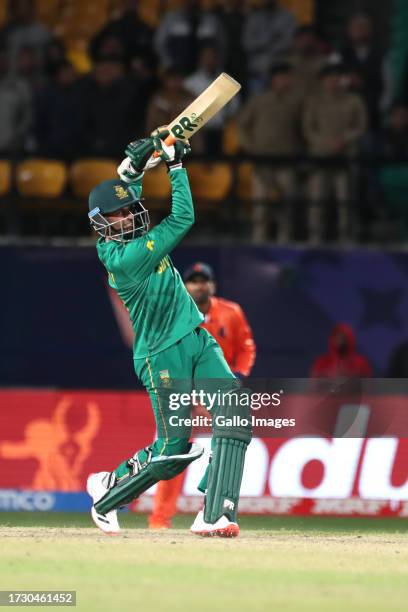 Keshav Maharaj of South Africa plays a shot during the game during the ICC Men's Cricket World Cup 2023 match between South Africa and Netherlands at...