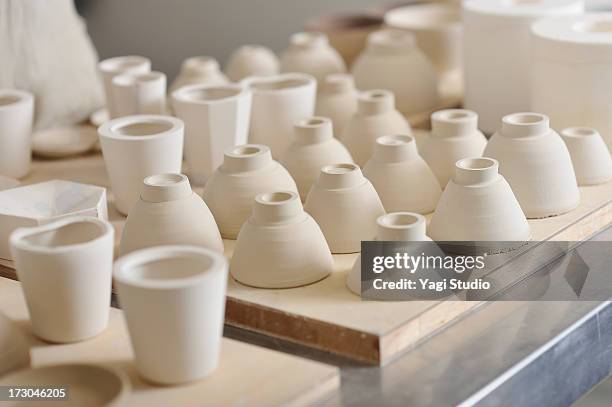 bowl women potters are making in studio - ceramic stockfoto's en -beelden