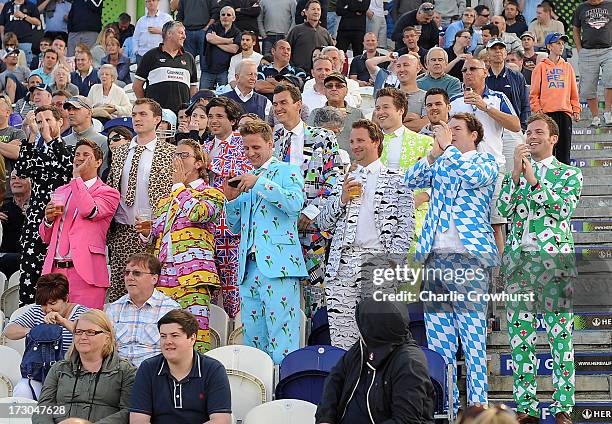 Fans enjoy the match during the Friends Life T20 match between Sussex Sharks and Hampshire Royals at The Brighton and Hove Jobs County Ground on July...