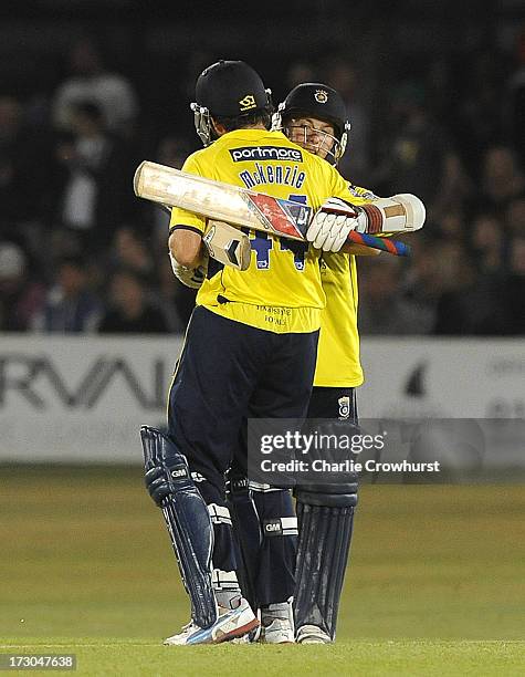 Neil McKenzie and Adam Wheater celebrate the teams win during the Friends Life T20 match between Sussex Sharks and Hampshire Royals at The Brighton...