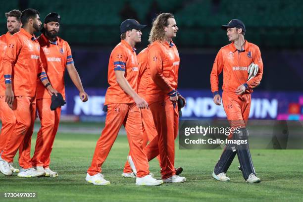 Netherlands team members celebrate their team's win over South Africa during the game during the ICC Men's Cricket World Cup 2023 match between South...