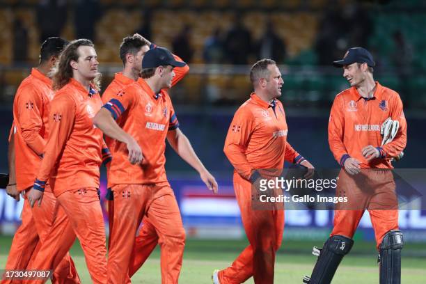 Netherlands team members celebrate their team's win over South Africa during the game during the ICC Men's Cricket World Cup 2023 match between South...