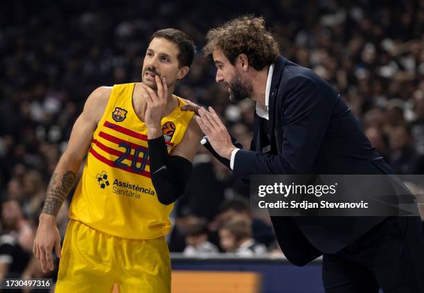 Roger Grimau, Head Coach of FC Barcelona speaks to Nicolas Laprovittola, #20 of FC Barcelona during the Turkish Airlines EuroLeague season 2023/2024...