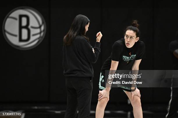 Breanna Stewart of the New York Liberty talks with Sandy Brondello during practice and media availability at the 2023 WNBA Finals on October 17, 2023...